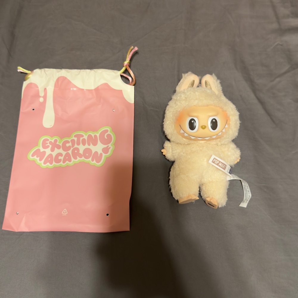 POP MART The Monsters Exciting Macaron Vinyl
Plush SOYMILK Labubu